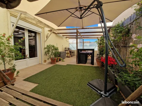 Maison divisée en 2 appartements