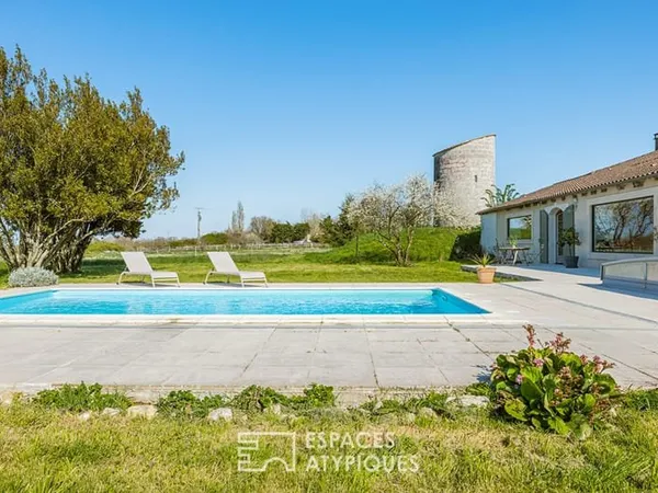 Propriété de charme avec son moulin regardant l'estuaire
