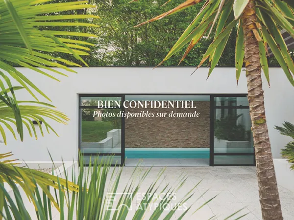 Maison contemporaine avec piscine intérieure, terrasse Sud et prestations haut de gamme