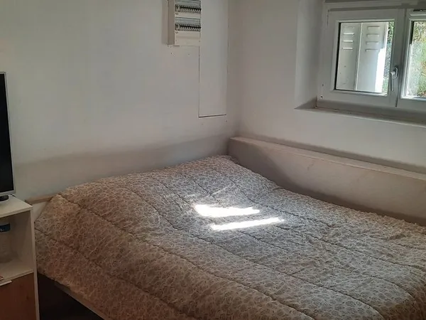 Location d'une chambre dans une maison individuelle