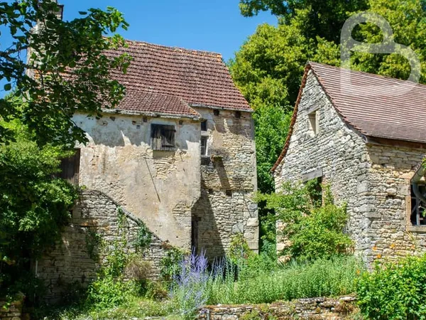 Maison en pierre à rénover avec grange et jardin près de Catus