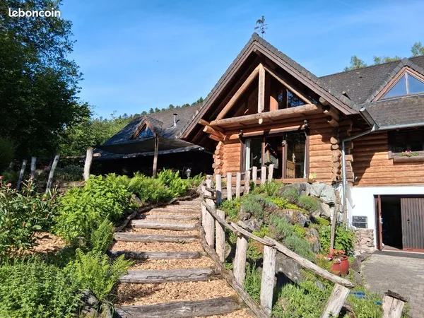 Grand chalet familial en rondins -216 m2 22 ares