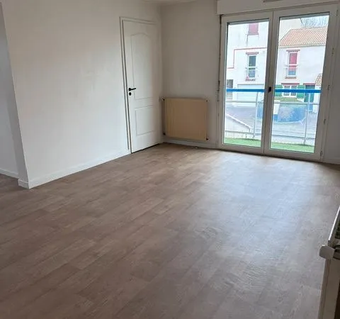 A saisir 1 appartement + 2 garages