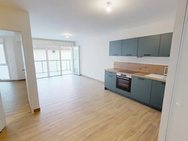 Appartement T2 en résidence récente, avec balcon et parking en