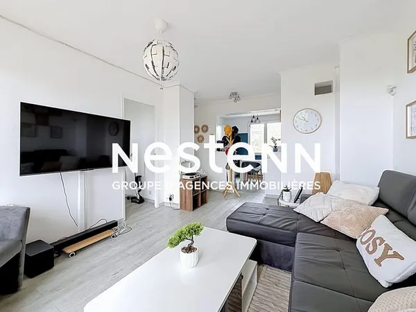 Appartement 4 pièces de 66 m2 avec balcon et cave proche du centre ville de Bron