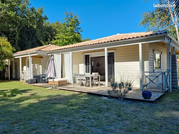 Maison ossature bois de plain-pied - 109 m² - 3 chambres - Terrain arboré 1 447 m²