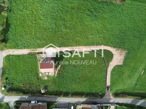 Terrain constructible et viabilisé - 1153 m²