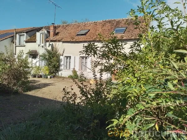 Longère au calme avec garage et grand terrain arboré