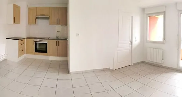 Joli F3 en RDC avec balcon couvert