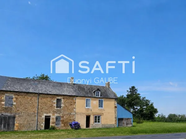 Authentique maison en pierre à réinventer ! Située au coeur de la campagne normande, cette ancienne 