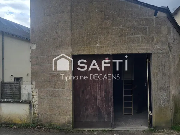 garage avec mezzanine, pouvant devenir un logement