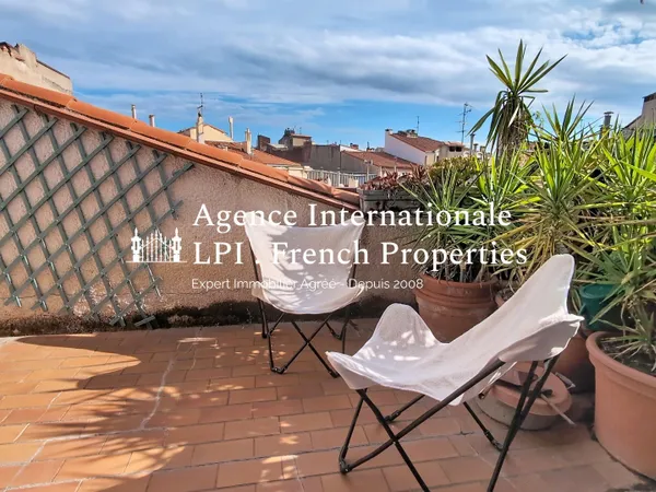 Appartement de type duplex avec terrasse 10.38 M² - Surf Hab 69.75 M² - Dernier étage - Immeuble ave