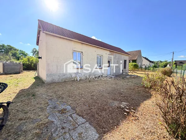 Maison de plain-pied avec terrain de 2 142 m² - Potentiel et environnement calme