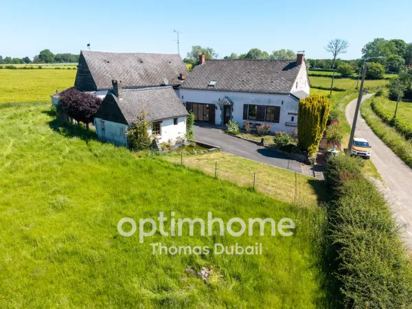 Maison avec grange et fort potentiel dans un environnement calme