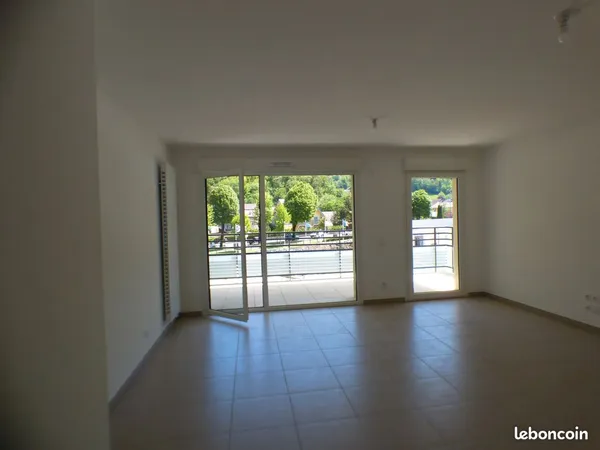 T4 centre-ville avec double garage en sus
