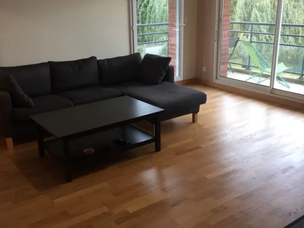 T3 meublé 65m² avec garage, balcon et ascenseur - Résidence récente