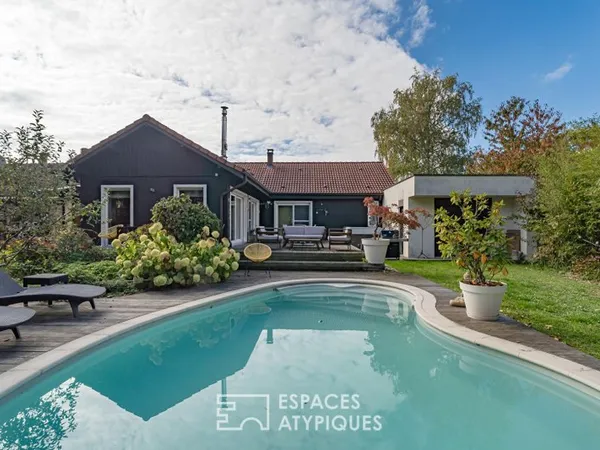 Maison familiale chaleureuse et son jardin intimiste