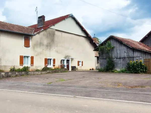Propriété 2 maisons avec terrain