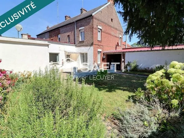 Jolie Propriété à conforter au potentiel d'env. 150 m2, idéalement située proche des commerces, gara