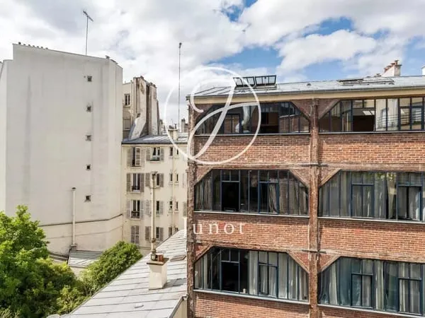Paris 18e - LAMARCK / CAULAINCOURT - Appartement style loft - 131,62m² Carrez - 174,38m² au sol - 5 