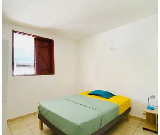 Chambre à louer en colocation meublée