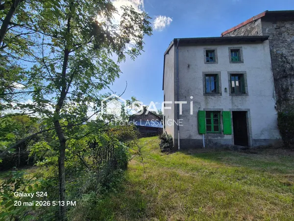 Maison à rénover avec beau potentiel