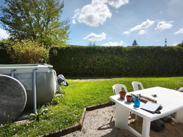 Maison de 90m² avec 3 chambres, jardin et garage