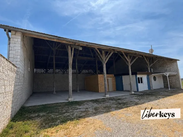 Grange de caractère avec dépendance provisoire - Fort potentiel d'aménagement