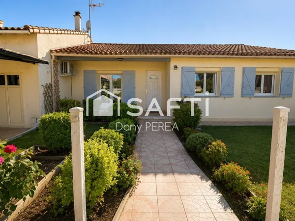 ? SAINT-LAURENT-D'AIGOUZE — Maison de plain-pied 100 m², 3 chambres, jardin et garage.