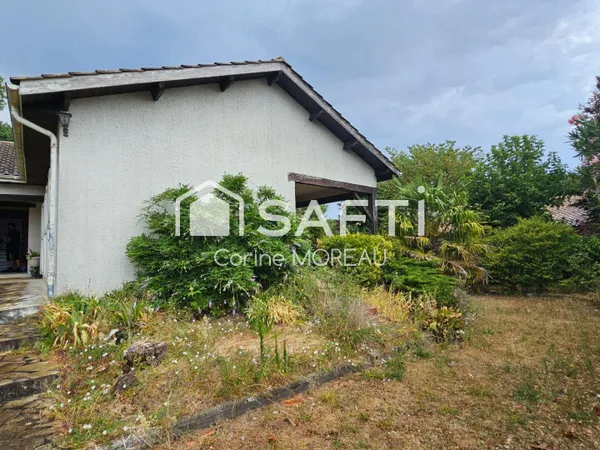 Maison de plain pied 3 chambres sur terrain arboré