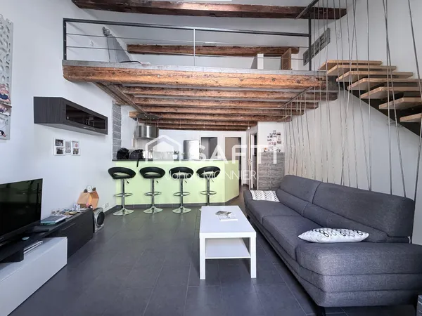 Maison de ville avec mezzanine et grand garage