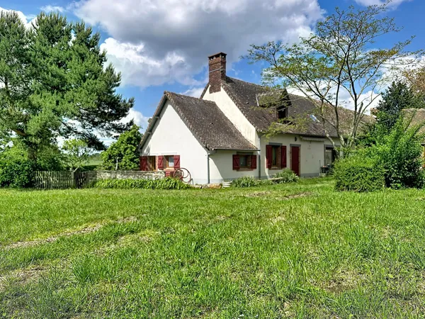 Maison de 133 m² avec dépendances et beau potentiel