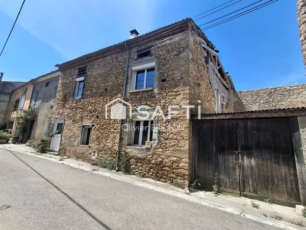 Maison avec beau potentiel au calme