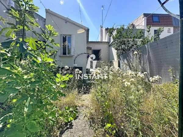 Maison de plain-pied avec jardin et sous-sol - Quartier des Fl