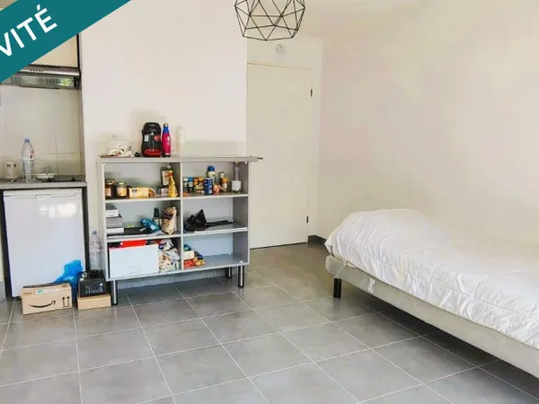 Studio avec balcon, vendu loué, parking inclus