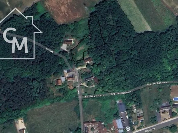 Terrain constructible de 1305 m2 + Bois