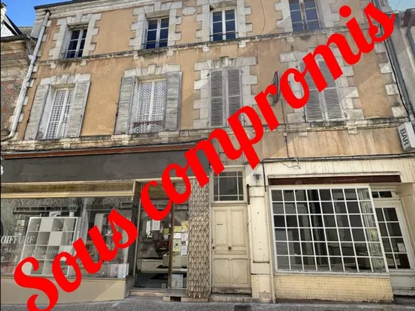 Immeuble de 3 appartements + 2 locaux commerciaux