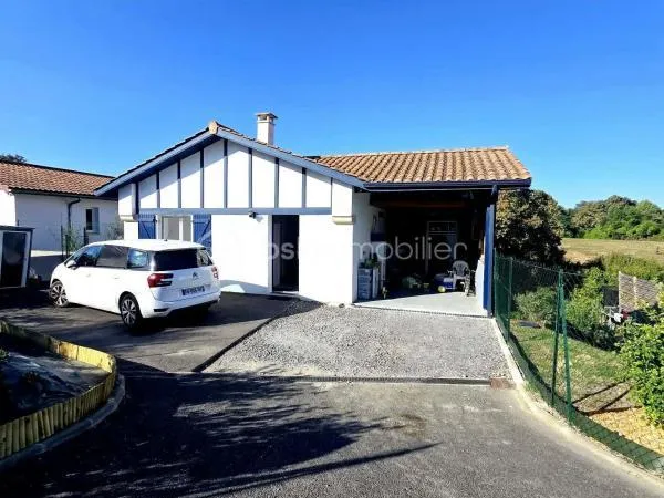 Maison avec terrasse et double parking - Vivez le confort moderne !