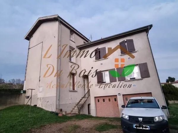 A VENDRE - Maison divisée en 2 appartements avec locataires