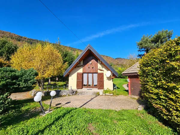 Chalet avec vue montagne - 4 pièces - 4 stationnements - terrain privatif - court de tennis