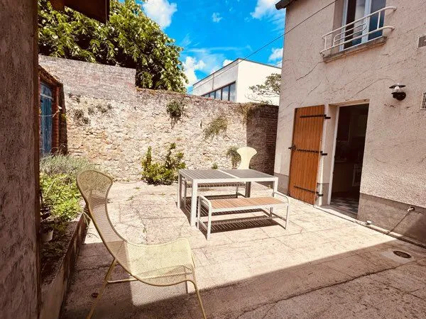 Maison 4 pièces avec extérieur en centre-ville