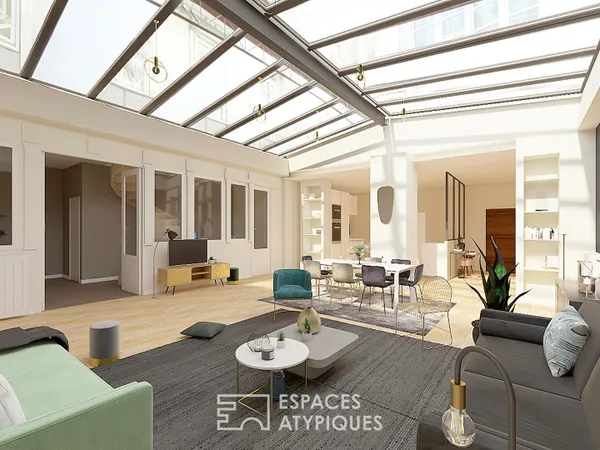 Élégance et lumière : un loft d'exception sous verrières au coeur du Triangle d'Or