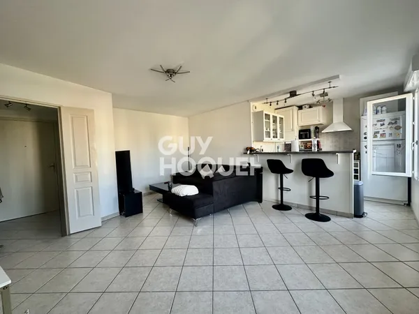 Appartement T2 avec garage et cave en location à DECINES CHARPIEU