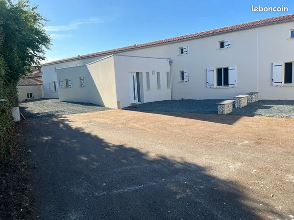 Maison neuve Lussant centre bourg