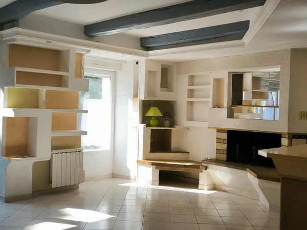 Ensemble Immobilier 2 maisons  et 1 commerce (dejà loué)