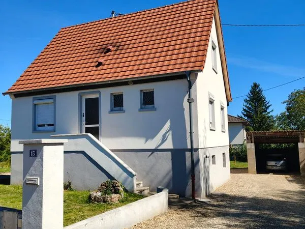Maison individuelle DPE B avec 140 m² d'espaces, vaste véranda, garage et jardin - Centre-ville à pi