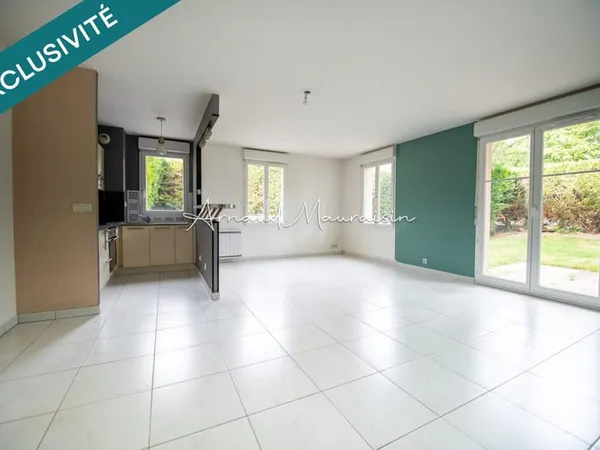 Appartement F3 en rez-de-chaussée avec jardin