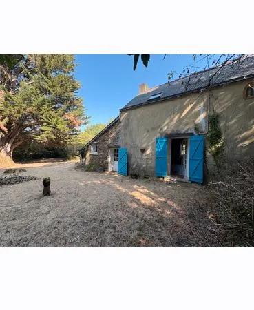 Maison et un terrain constructible
