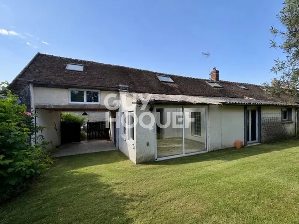 Maison 4 pièces de 130 m2 sur un terrain de 1168m² avec une grange