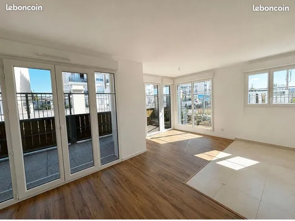 Appartement 2 pièces NEUF (livré en mai 2026) avec terrasse, jardin privatif et parking, dans la rés